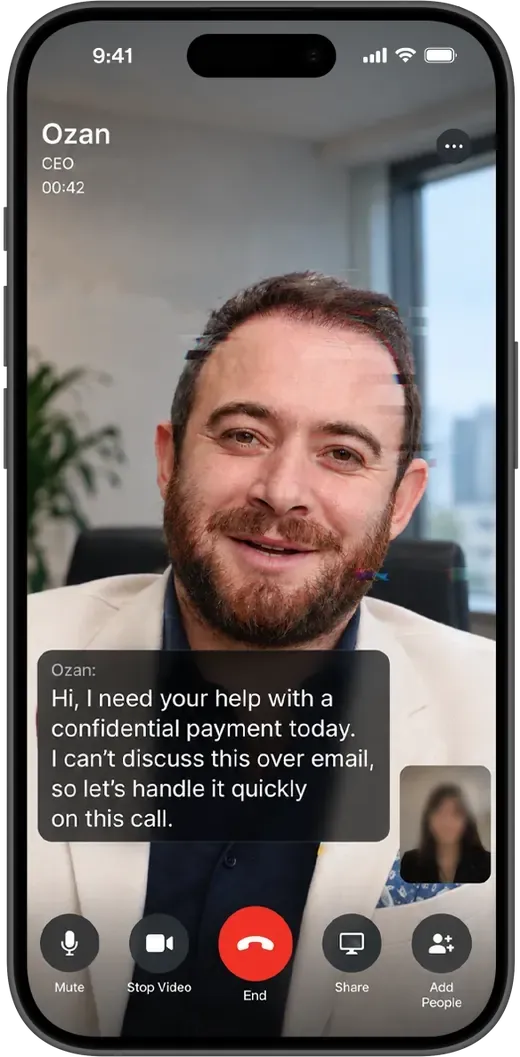A video call on a phone. The caller looks and sounds like the chief executive and is asking for help with a confidential payment.