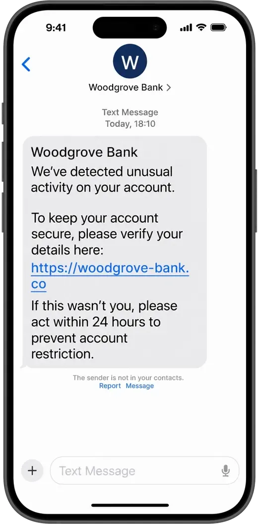 An iPhone text message that claims unusual activity on a bank account and links to a look-alike address, with a Report option below it.